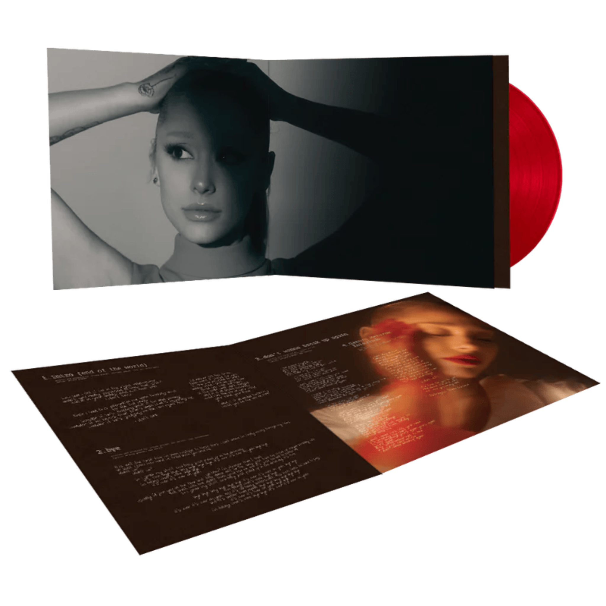 Vinyl record with a black and white cover and a red disc, featuring a woman's face.